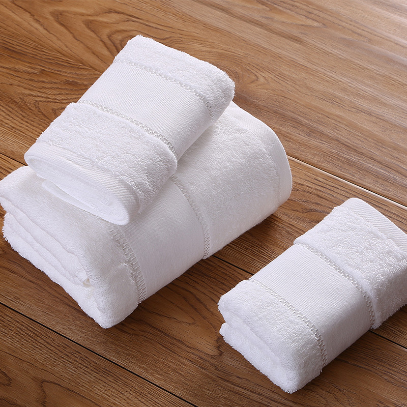 Juego de toallas con borde dobby blanco hilo plateado Juego de toallas con borde dobby blanco hilo plateado